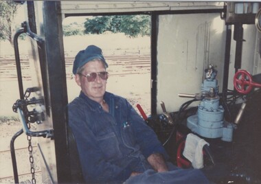 Driver Ned Ziebell inside the steam train R761