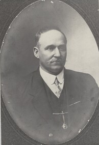 A formal photo of John Bennet Bruce