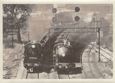 Two locomotives departing Wodonga side by side.