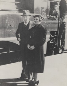 Railway Commissioner Harold Clapp and Mrs. Clapp at Albury station in 1938. Spirit of Progress and its driver in the background.