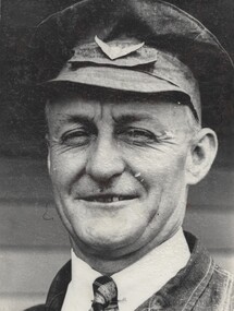 Ray Murphy, Driver of "Spirit of Progress" wearing cap with wing badge.