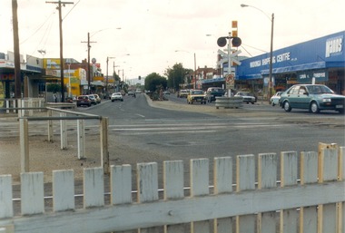 High Street Wodonga looking north from the railway crossing. Crossing lights on the right