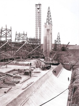 Work proceeding inside the coffer dam. Spillway taking shape.