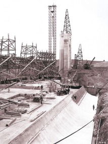 Work proceeding inside the coffer dam. Spillway taking shape.