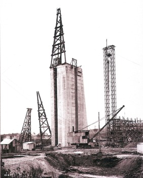 Concrete pillar for tall tower, showing back and upstream side of the tower.