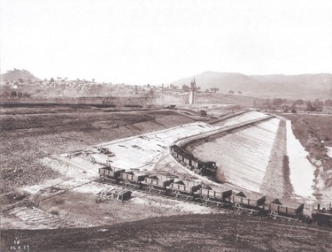 Concrete slabs in place on embankment