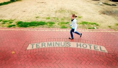 Terminus Hotel sign incorporated into footpath