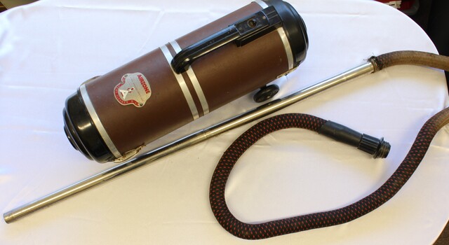 Vacuum cleaner with hose attached