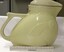 Side view of electric jug including scale in centimetres