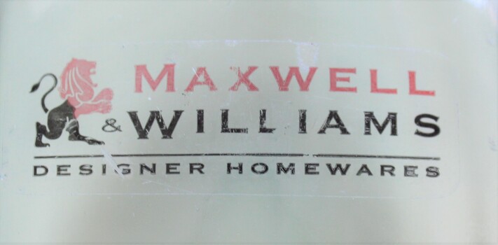 Maxwell &Williams logo including British lion imprinted on side of bottle