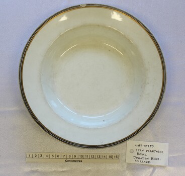 Shallow Vegetable Serving bowl, white ceramic with gold trim showing scale in centimetres.
