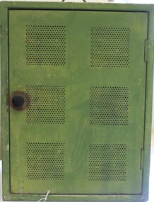 A meat safe painted green. 6 sets of vents in door.