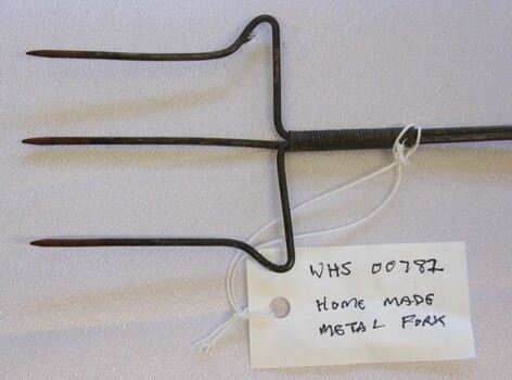 Head of toasting fork with catalogue tag