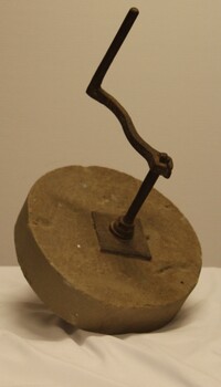 Sandstone grinding wheel showing handle