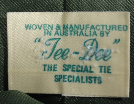 TIe Manufacturer's mark sewn into the tie