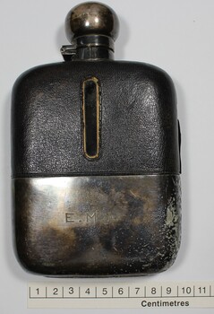 Hip flask owned by Rat of Tobruk Arthur Lock with scale