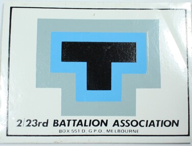 2/23rd Battalion logo transfer attached to card and laminated.