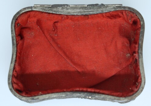 Internal view of Jewellery box showing red satin lining
