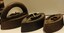 Set of Mrs Potts' sad irons with interchangeable handle