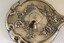Silver hand mirror back  showing embossed design and letter M