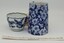 Jug and cup with horizontal scale in centimetres
