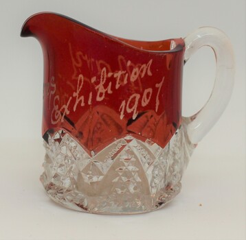 Ruby Glass and crystal jug inscribed with "Exhibition 1907".