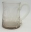 Glass mug with etched leaf design 