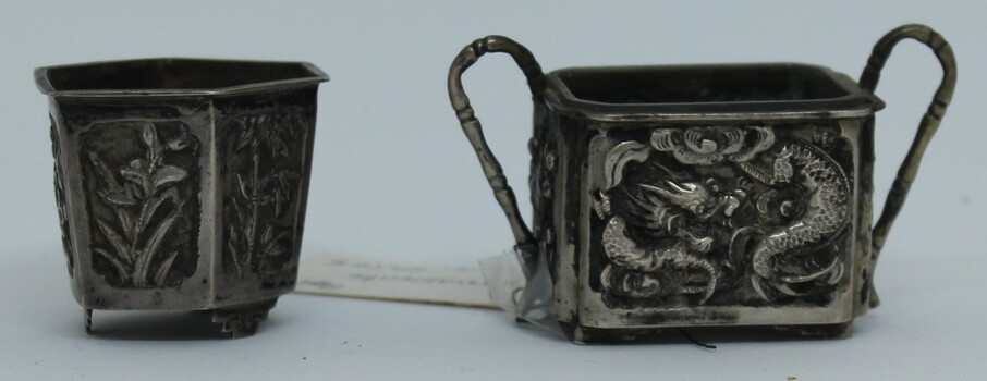 Miniature metal ornaments with embossed design