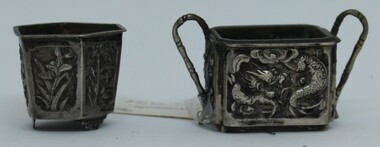 Miniature metal ornaments with embossed design