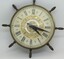 Nautical style Smith's Battery clock - round with Roman numerals and central gold pattern