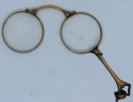 A pair of lady's brass rimmed lorgnette spectacles