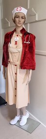 Red Cross Uniform - Grace Hamilton-Smith showing name badge and other Red Cross Service badges