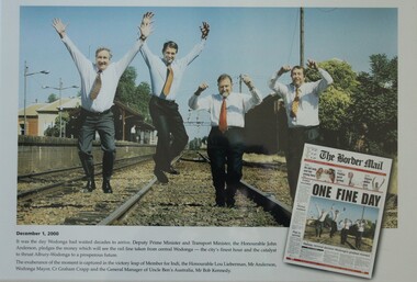 Image of newspaper front page and 4 men jumping on railway track.