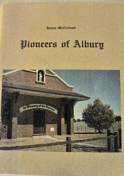 Cover showing image of pioneer memorial.