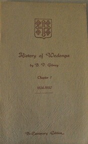 A small booklet bearing a coat of arms in red text.
