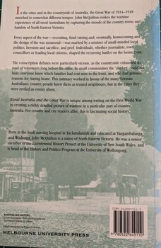 Back cover showing image of a country town and book synopsis.