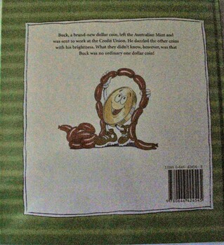 Back cover showing Buck playing with a string of sausagex.