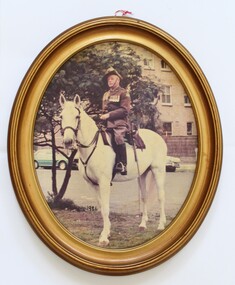 Des Martin mounted on his horse in full uniform