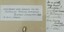 Written notes included in frame with badges including dedication by Betty Barberis