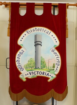 Red Banner with an image of the Water Tower in Wodonga, Victoria