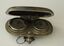 Small silver case with fob clip designed to hold sovereign and half sovereign coins,