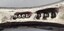 Hallmark on one side of implement