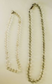 2 strings of glass beads with metal clasps