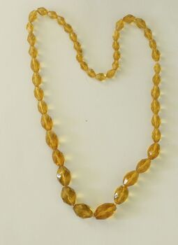 A long string of yellow glass beads
