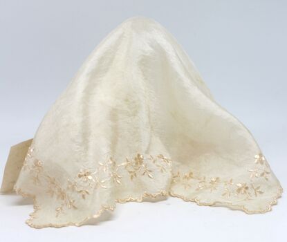 An embroidered silk handkerchief or covering