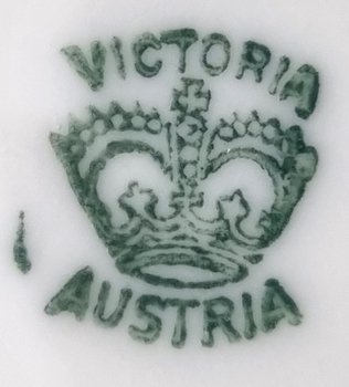 Green hallmark on bottom of shaving mug