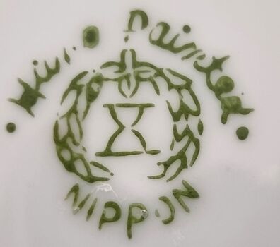 Hallmark in green including hour glass and laurel wreath