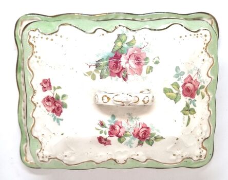 Top view of lid showing rose design