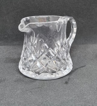 A small jug from this set, suitable for cream or milk.
