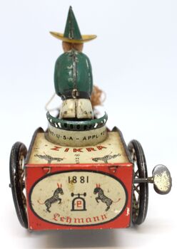 Rear view of toy cart showing manufacturer's mark "Lehmann"